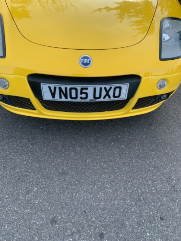 398116