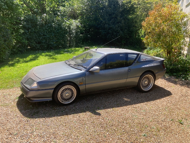 428115